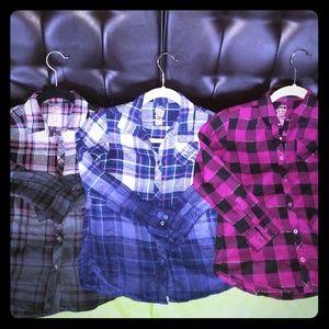 3 Girls Flannel button up shirts